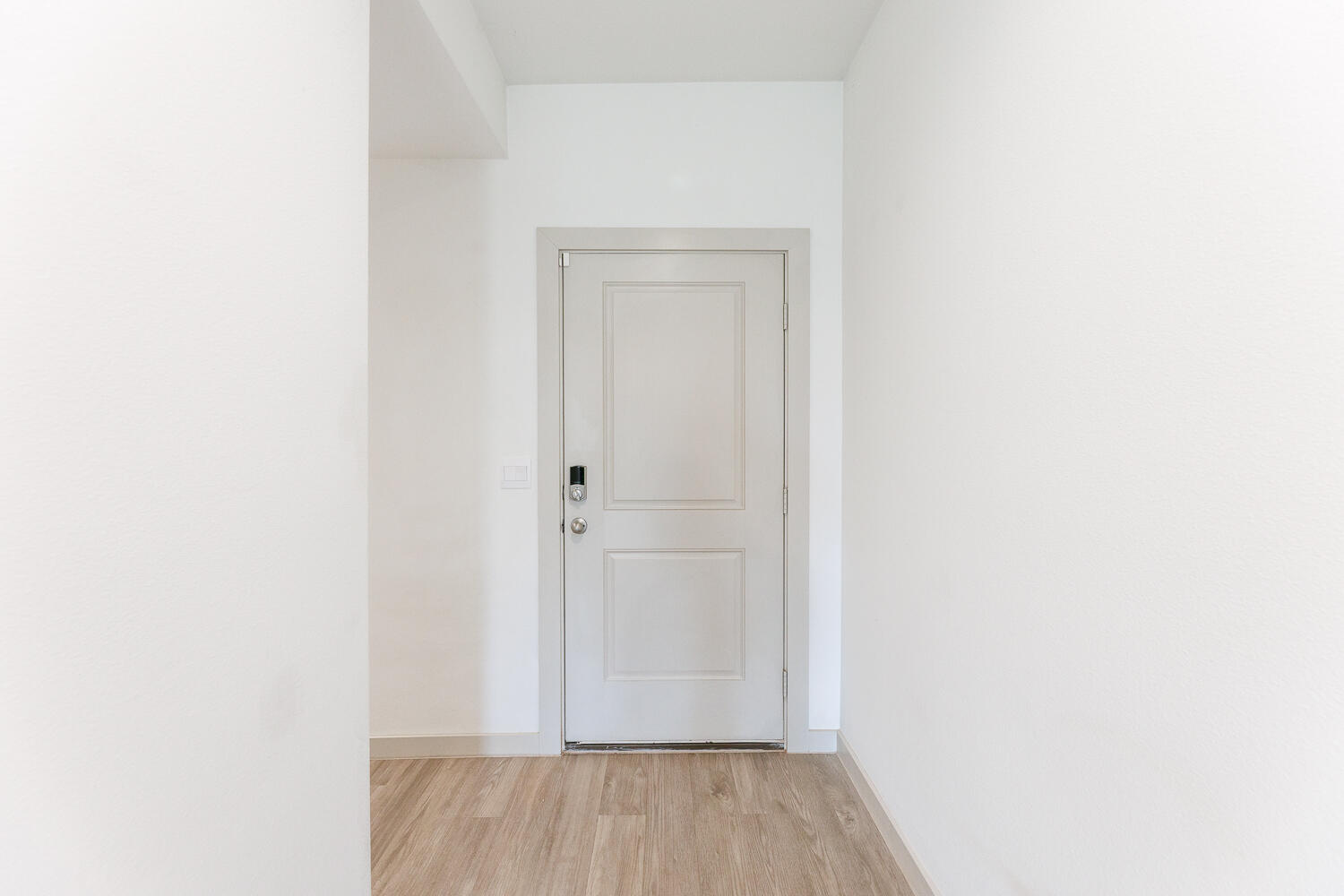 2305 150th Street Lubbock, TX 79423 - Photo 3 of 39 a view of a room with wooden floor