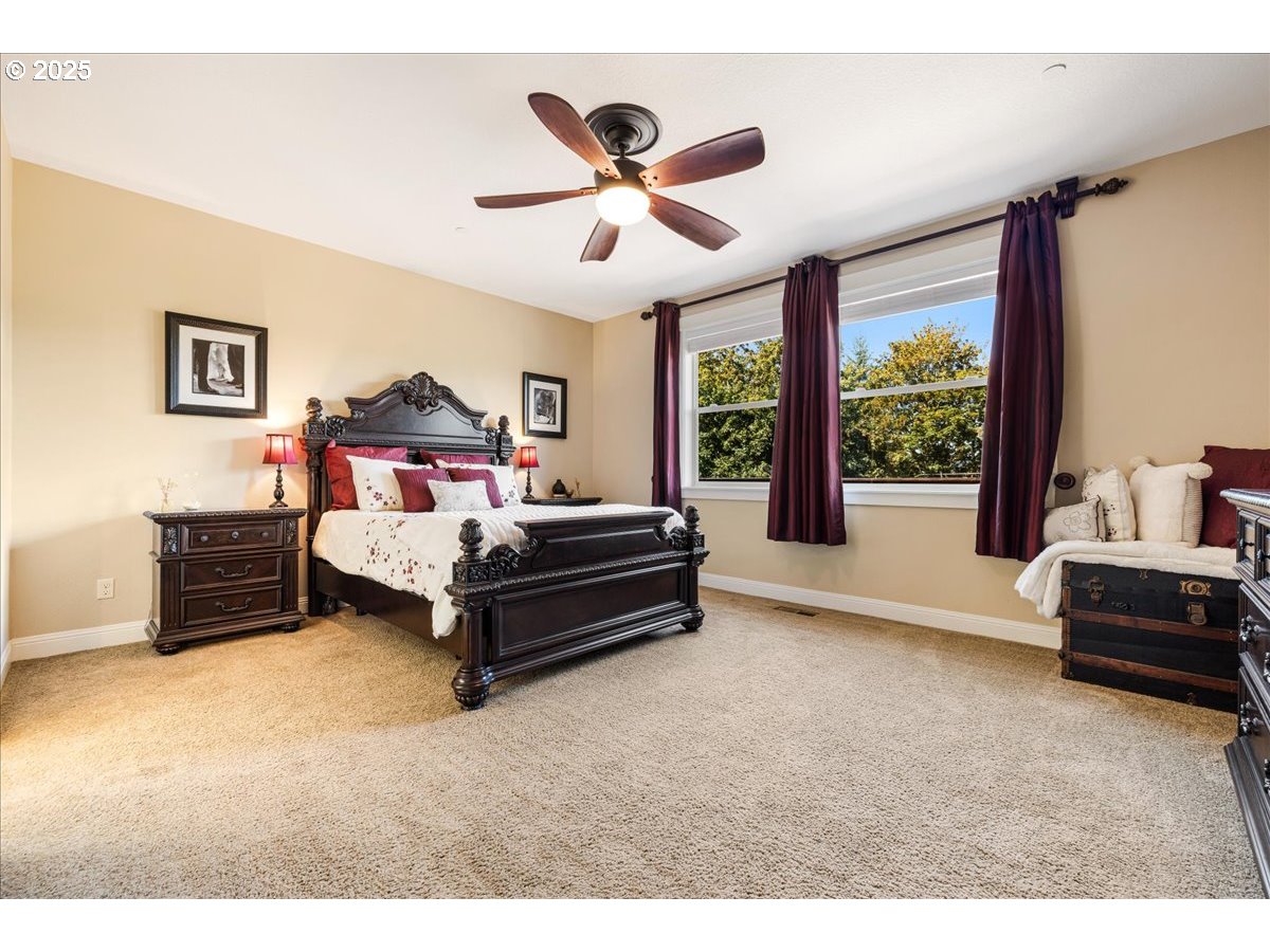 45632 Northwest Mead Way Banks, OR 97106 - Photo 13 of 48 a bedroom with furniture and a large window