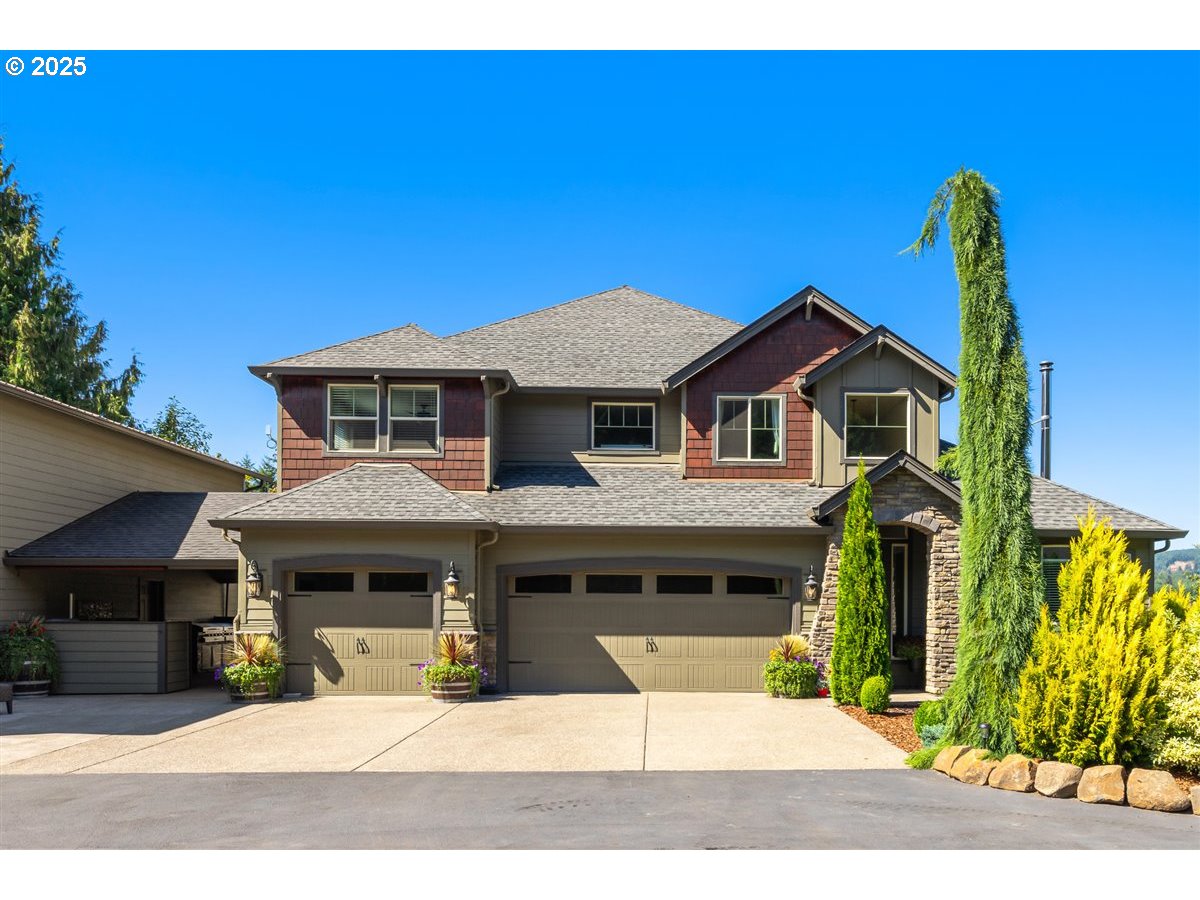 45632 Northwest Mead Way Banks, OR 97106 - Photo 2 of 48 a view of a house with wooden fence