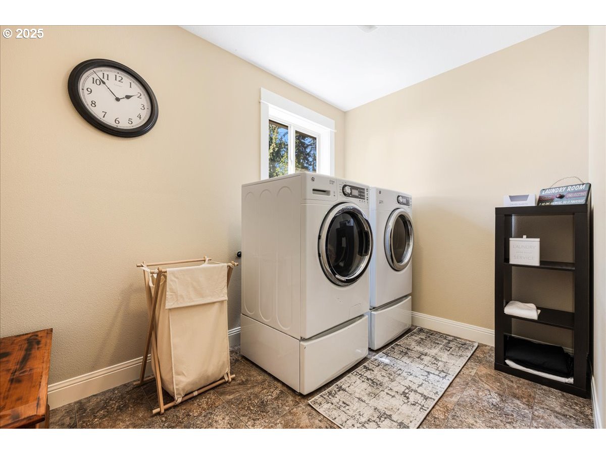 45632 Northwest Mead Way Banks, OR 97106 - Photo 23 of 48 a utility room with dryer and washer