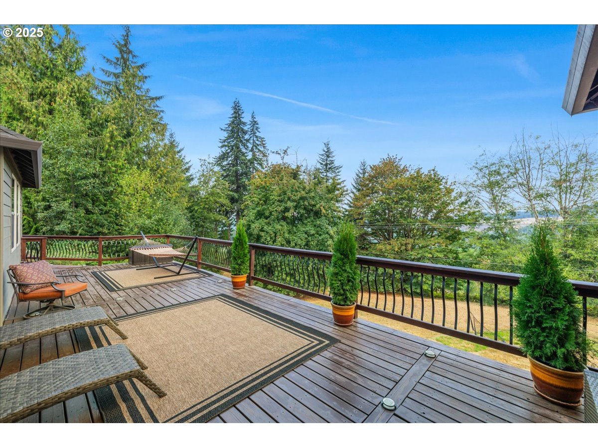 45632 Northwest Mead Way Banks, OR 97106 - Photo 27 of 48 a view of a wooden deck with sunset view