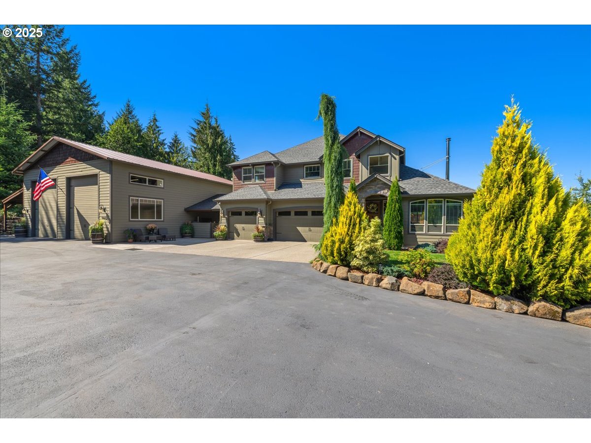 45632 Northwest Mead Way Banks, OR 97106 - Photo 42 of 48 a front view of a house with a yard