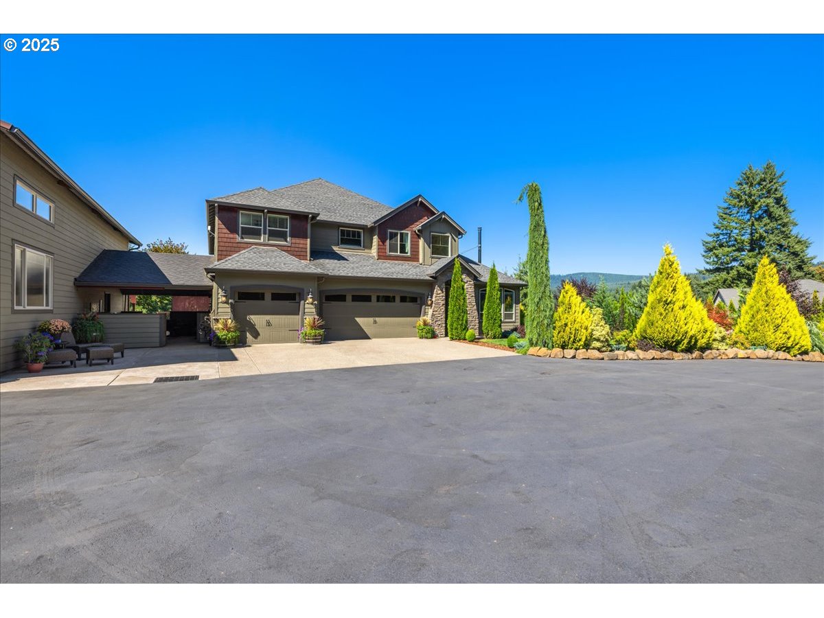 45632 Northwest Mead Way Banks, OR 97106 - Photo 47 of 48 a view of an house with backyard space and balcony