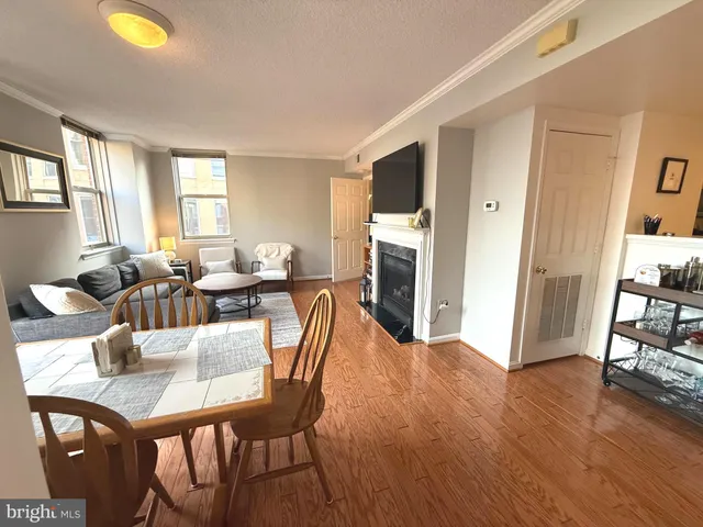 a bedroom with a bed and a night stand