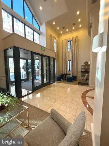 a view of a patio with a table and chairs