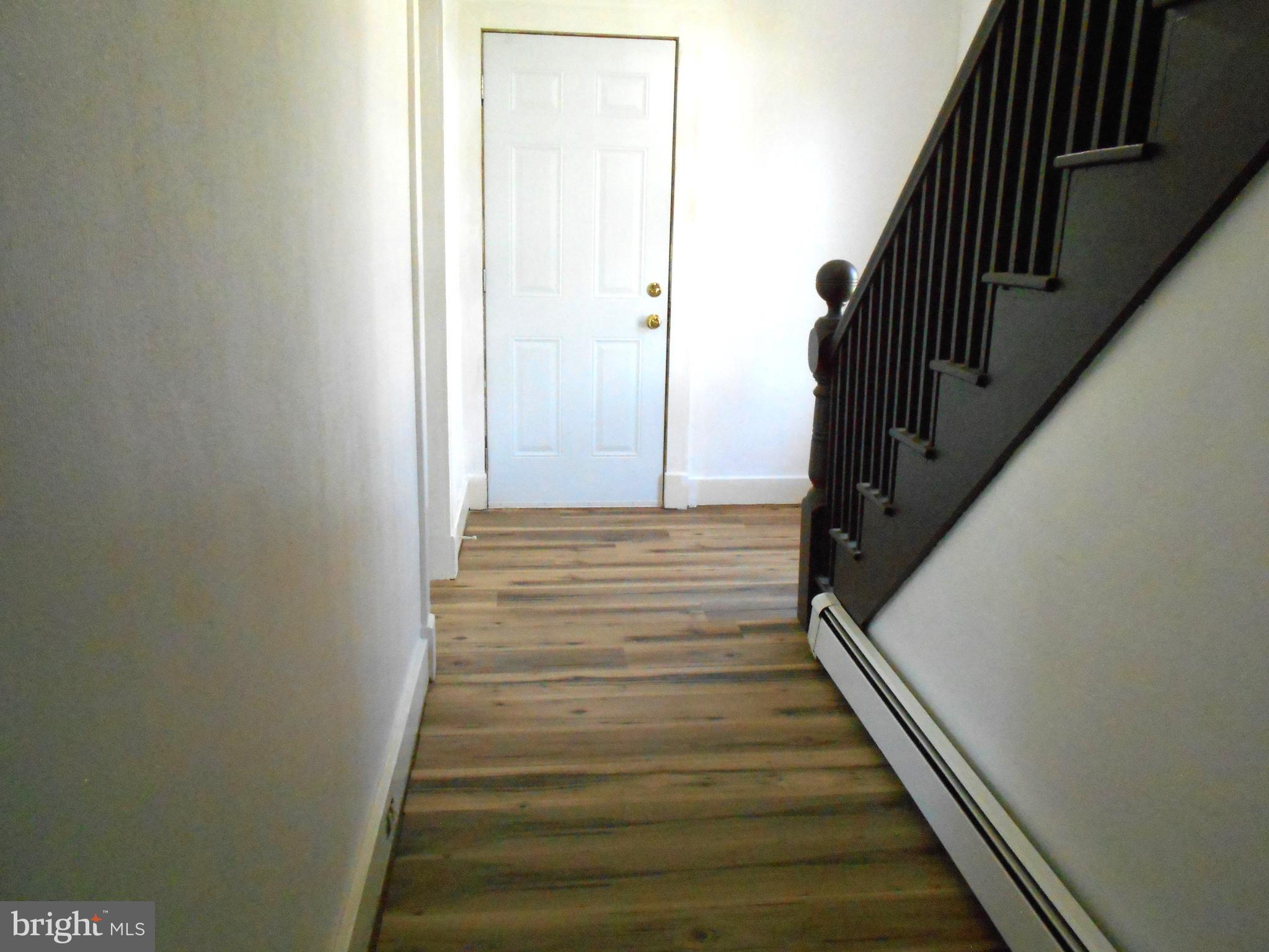 5841 Hudson Wharf Road Cambridge, MD 21613 - Photo 9 of 45 First floor foyer/hall w/new flooring