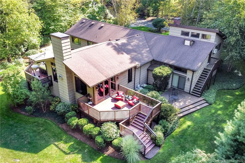 171 Hardesty Road Stamford, CT 06903 - Photo 1 of 1 an aerial view of a house with swimming pool and big yard