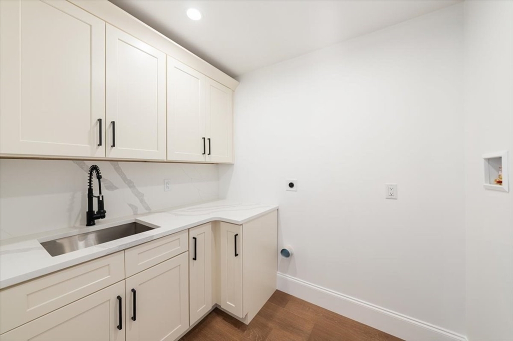 37 Longfellow Road Natick, MA 01760 - Photo 15 of 25 a view of cabinets with wooden floor