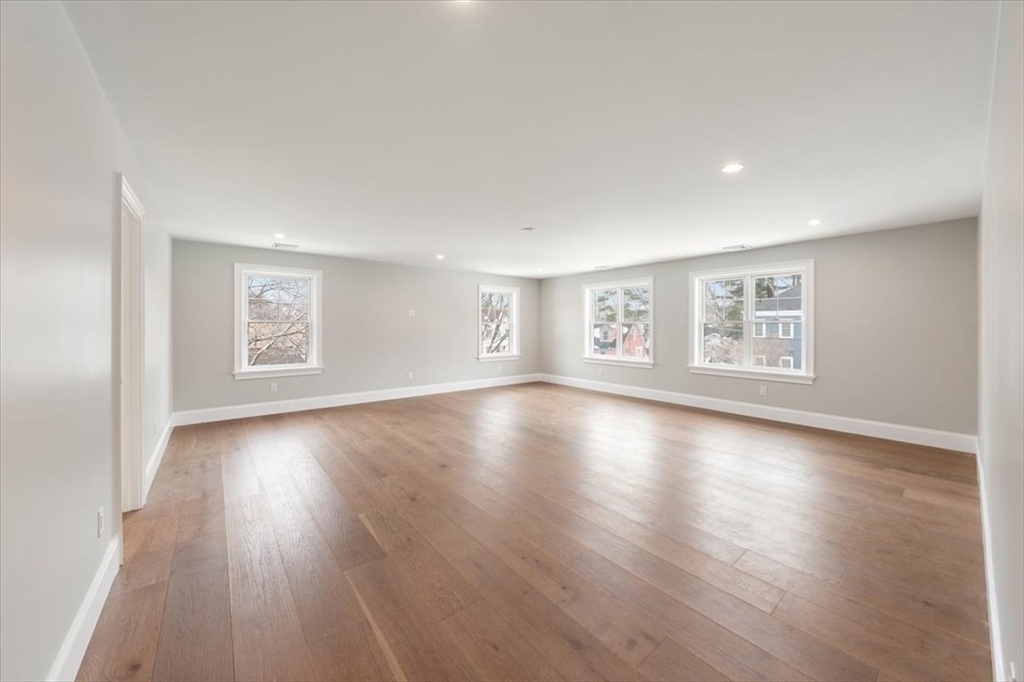 37 Longfellow Road Natick, MA 01760 - Photo 16 of 25 a view of an empty room with wooden floor and a window