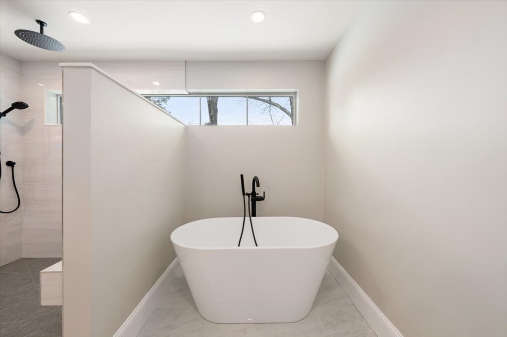 37 Longfellow Road Natick, MA 01760 - Photo 19 of 25 a bathroom with a bathtub and a shower