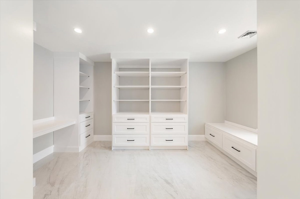 37 Longfellow Road Natick, MA 01760 - Photo 20 of 25 a room with a baby crib and a dresser