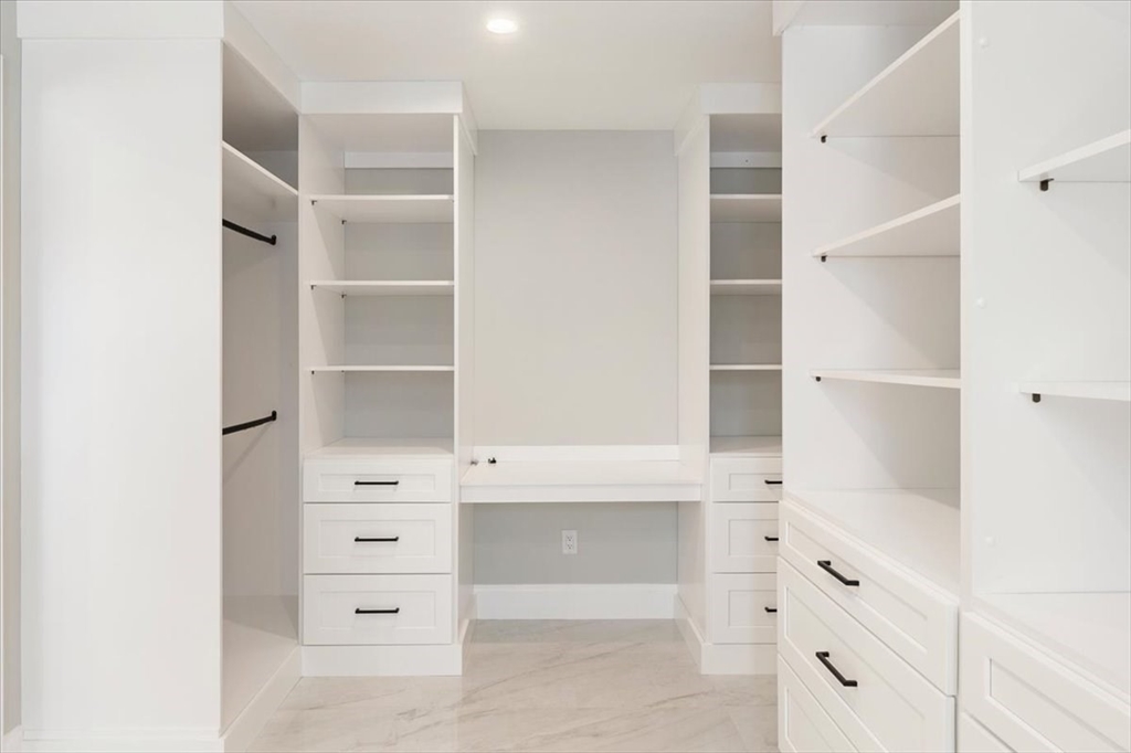 37 Longfellow Road Natick, MA 01760 - Photo 22 of 25 a view of an empty walk in closet