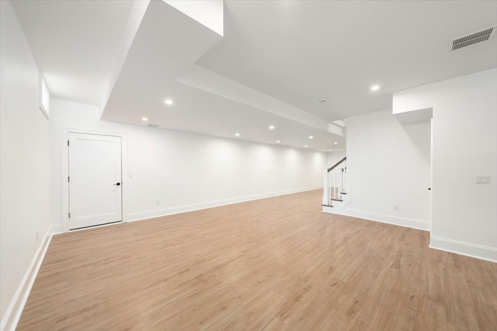37 Longfellow Road Natick, MA 01760 - Photo 23 of 25 a view of an empty room with wooden floor
