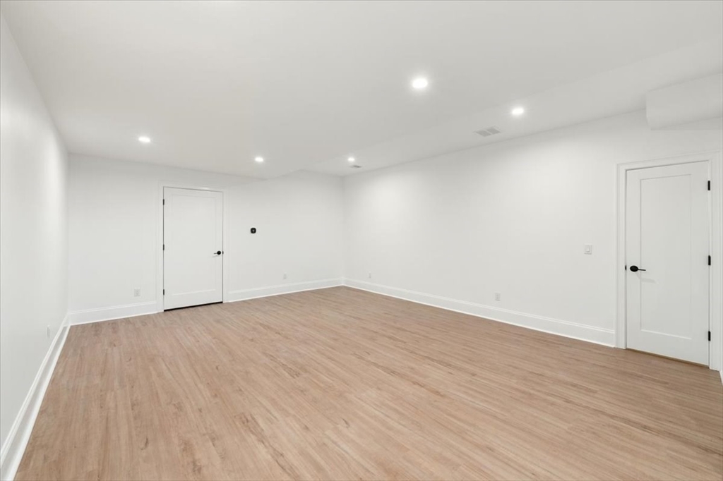 37 Longfellow Road Natick, MA 01760 - Photo 25 of 25 an empty room with wooden floor