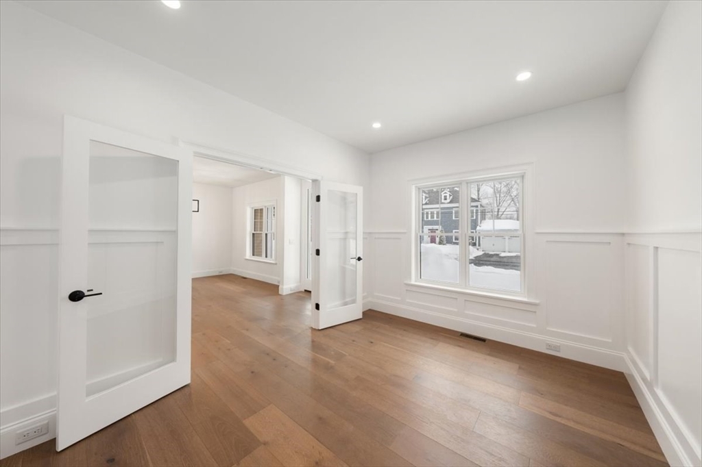 37 Longfellow Road Natick, MA 01760 - Photo 6 of 25 wooden floor in an empty room with a window