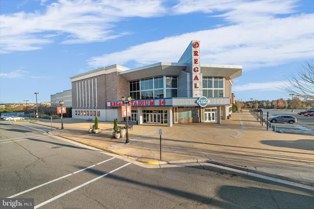 a view of a lobby with a table and chairs