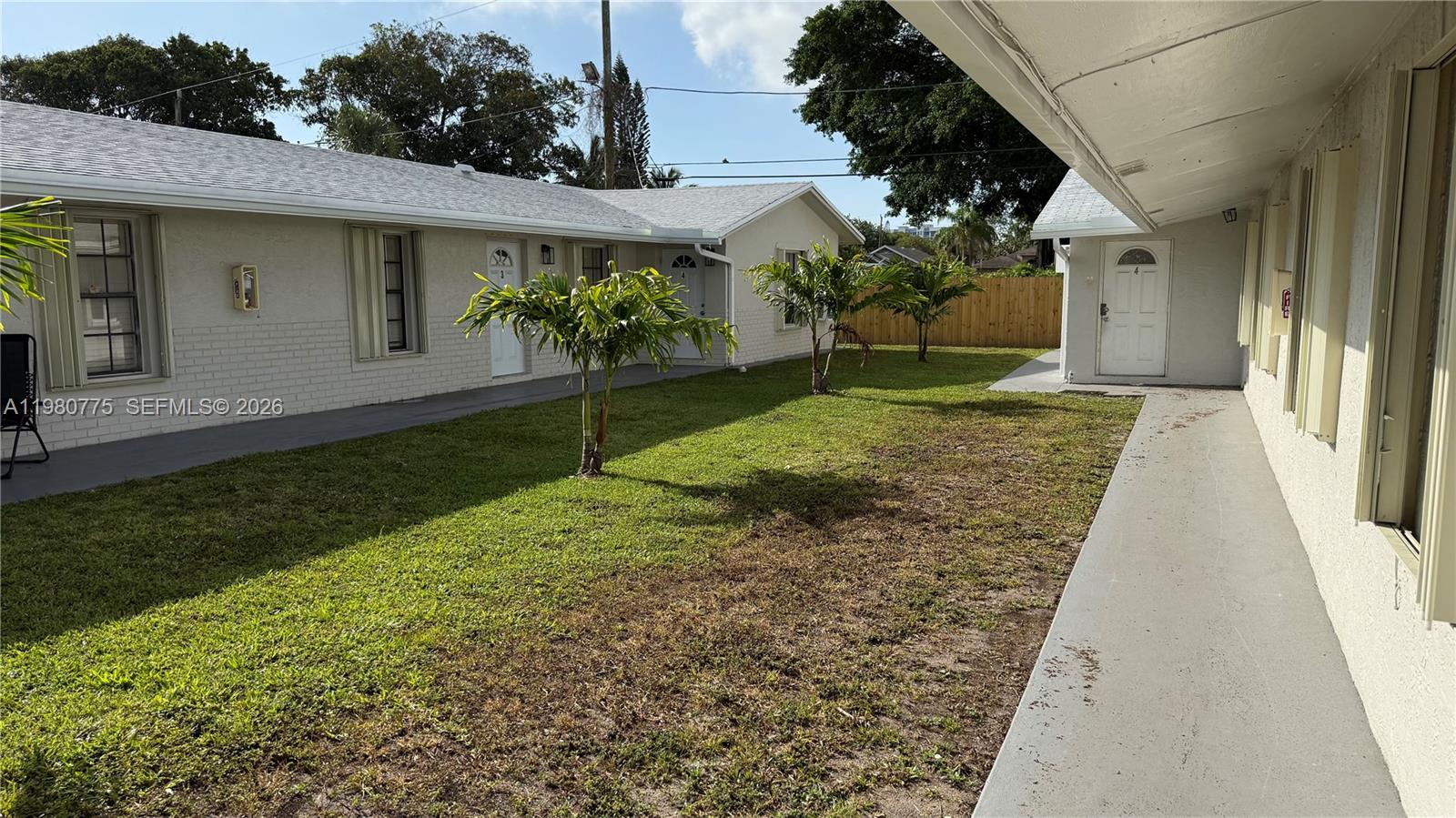 220 Northwest 12th Street Pompano Beach, FL 33060 - Photo 14 of 77 a view of a back yard of the house