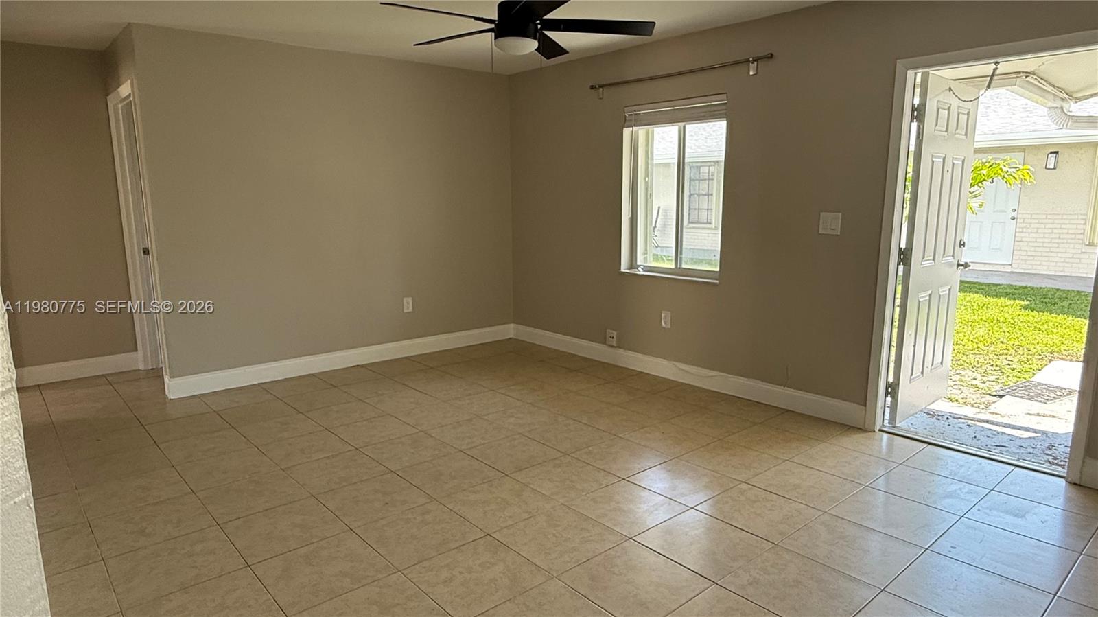 220 Northwest 12th Street Pompano Beach, FL 33060 - Photo 59 of 77 a view of an empty room and a window
