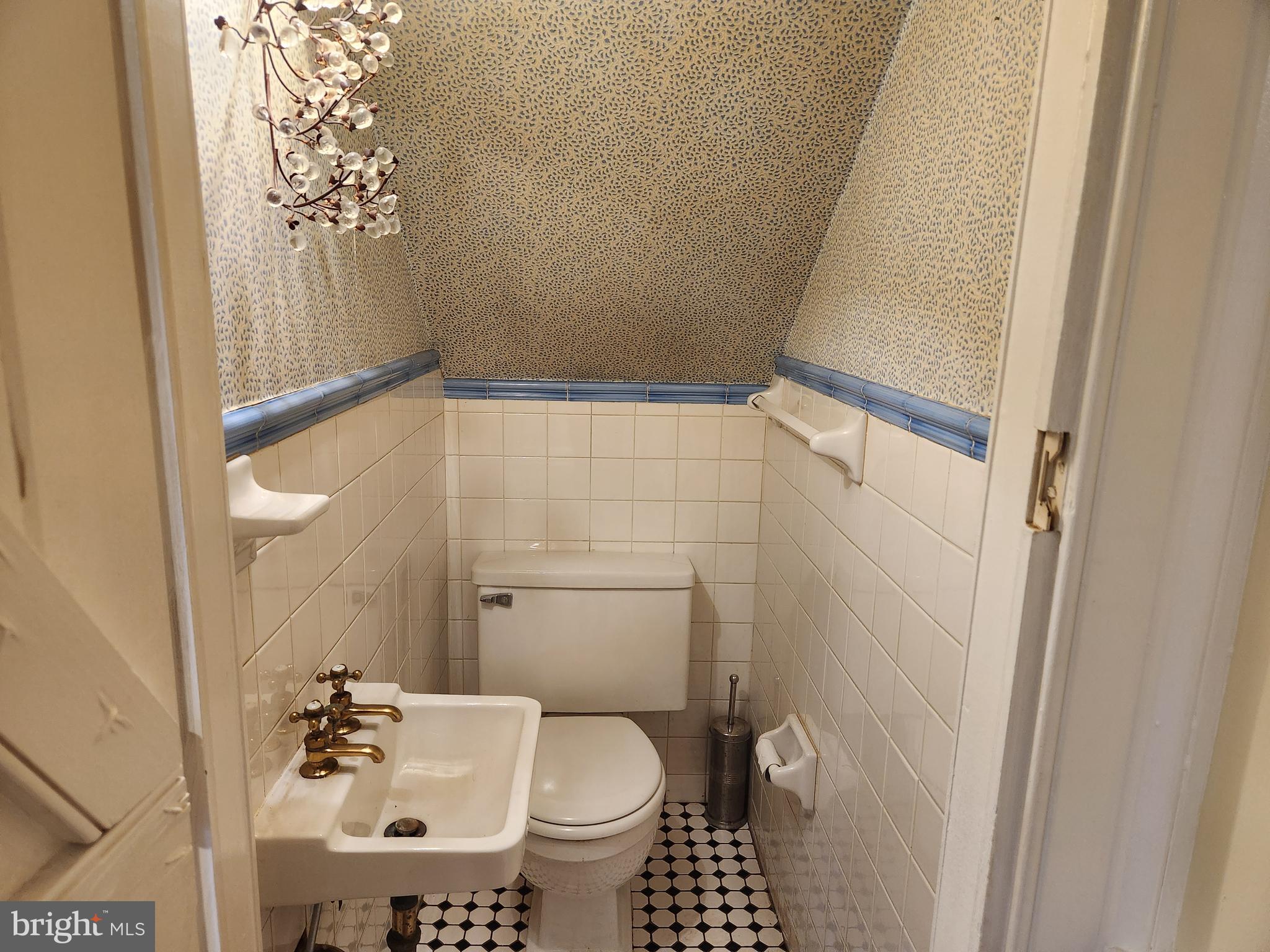 316 Princess Anne Street Fredericksburg, VA 22401 - Photo 15 of 44 a bathroom with a granite countertop shower a toilet and a sink