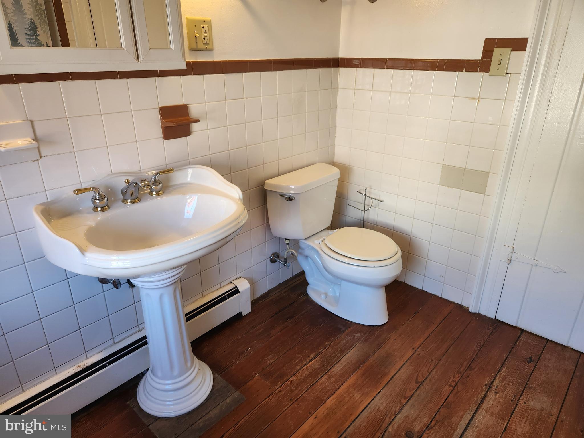 316 Princess Anne Street Fredericksburg, VA 22401 - Photo 20 of 44 a bathroom with a toilet and a sink
