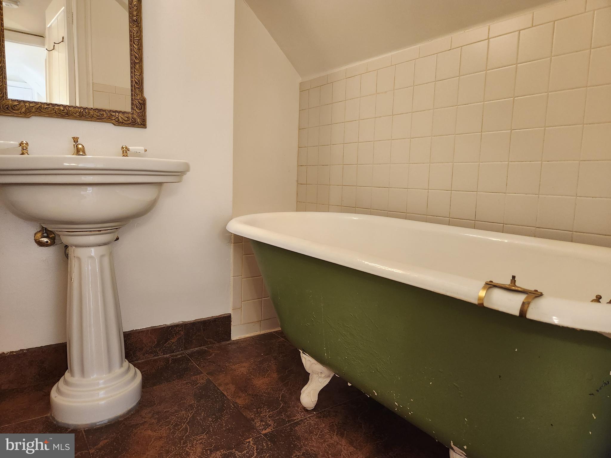 316 Princess Anne Street Fredericksburg, VA 22401 - Photo 29 of 44 a bathroom with a sink and a mirror
