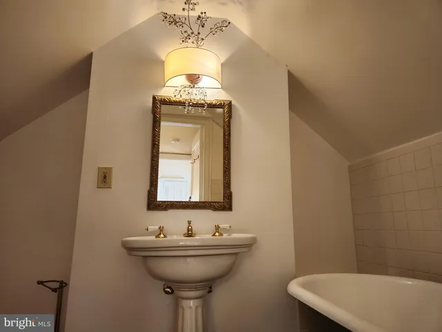 a view of wooden floor in an empty room