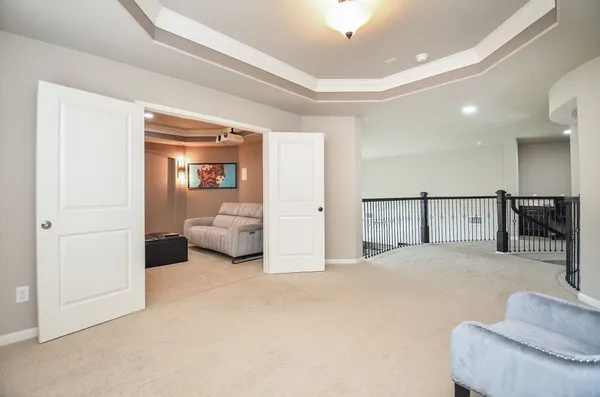 a bedroom with furniture and a couch