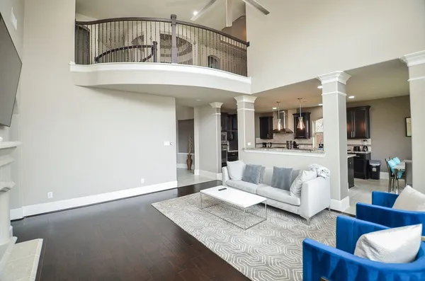 a living room with furniture and view of living room
