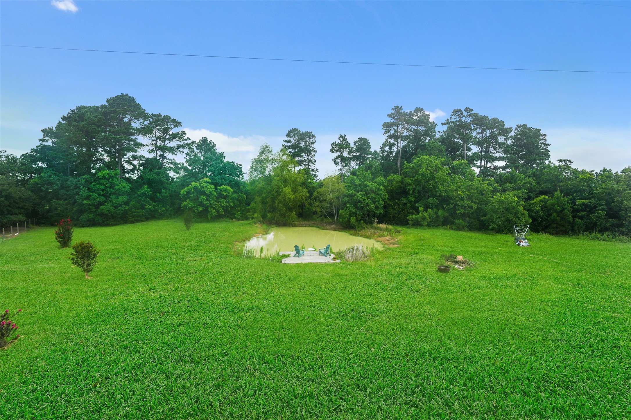 26534 Mitchell Road Hempstead, TX 77445 - Photo 38 of 45 a view of a golf course with a garden