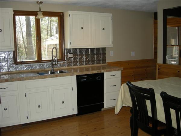 8 Kilsyth Road Easton, MA 02375 - Photo 4 of 7 a kitchen with granite countertop white cabinets white appliances with a sink and dishwasher