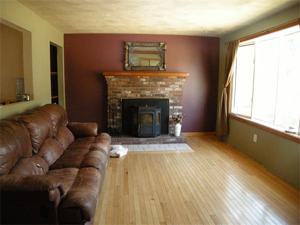 8 Kilsyth Road Easton, MA 02375 - Photo 5 of 7 a living room with furniture and a fireplace