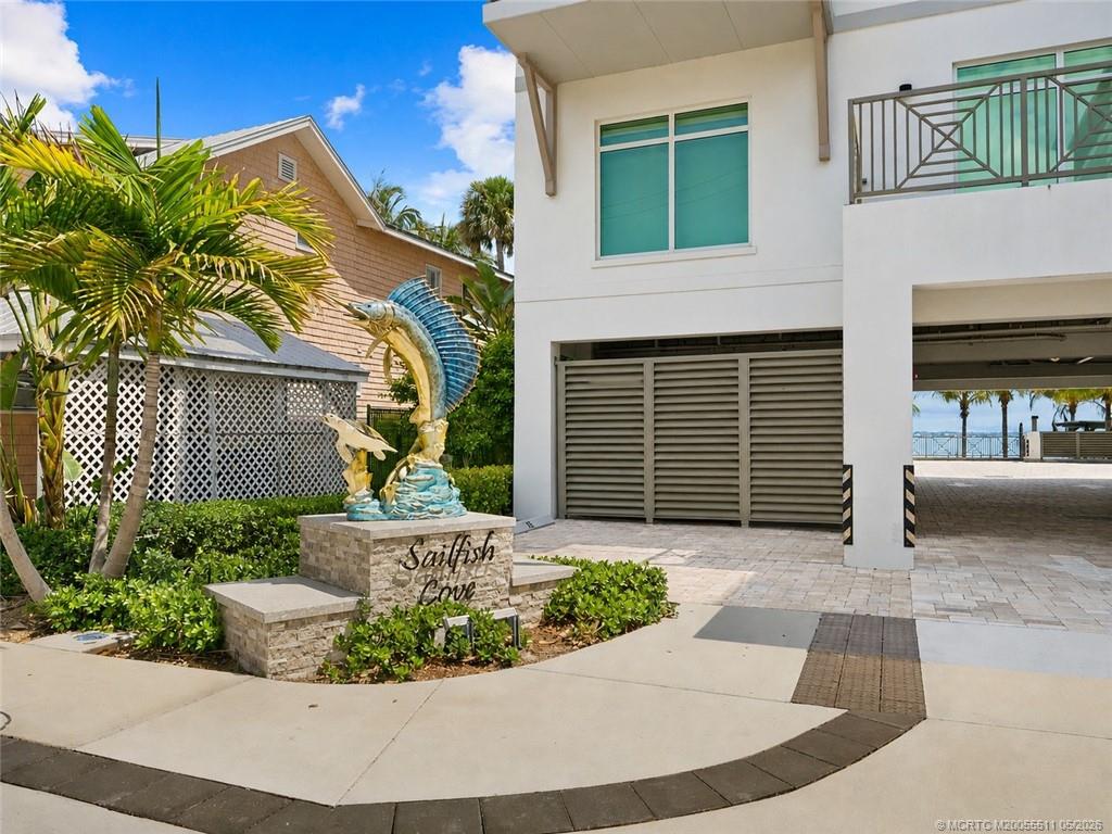 41 Southwest Seminole Street, Unit 208 Stuart, FL 34994 - Photo 2 of 46 a view of a house with entertaining space