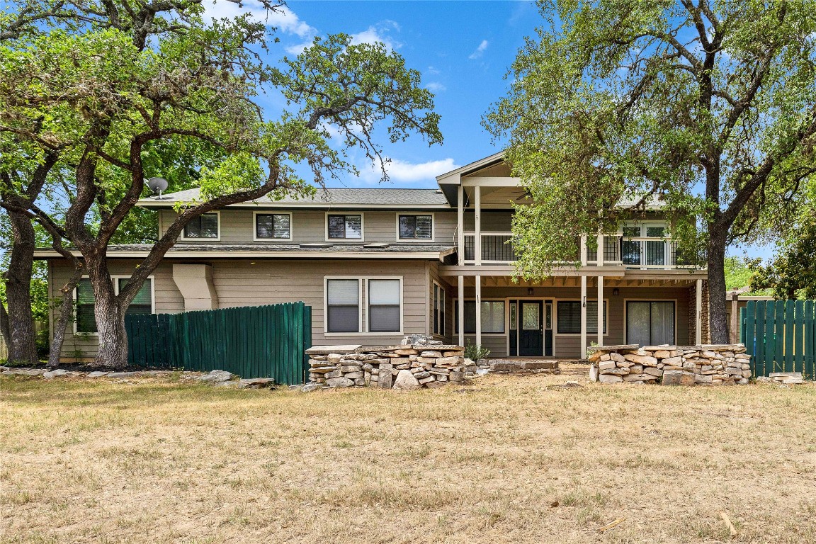 5708 Beacon Drive Austin, TX 78734 - Photo 1 of 1 a front view of a house with a yard
