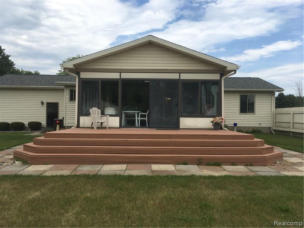 10085 North Webster Road Clio, MI 48420 - Photo 3 of 40 Deck & 20 x 20 Heated Sun Room!