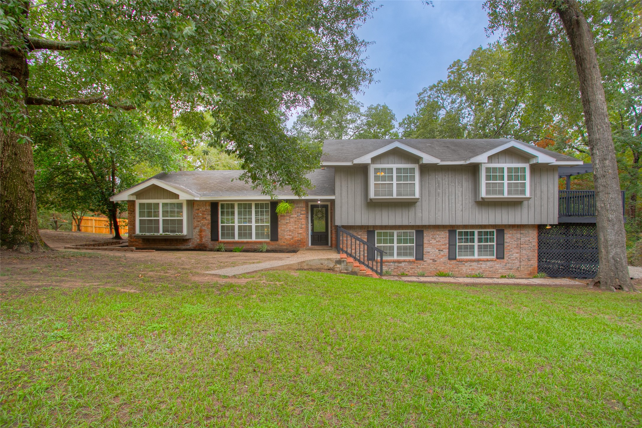 Gorgeous home on approximately two acres in the city limits of Conroe!