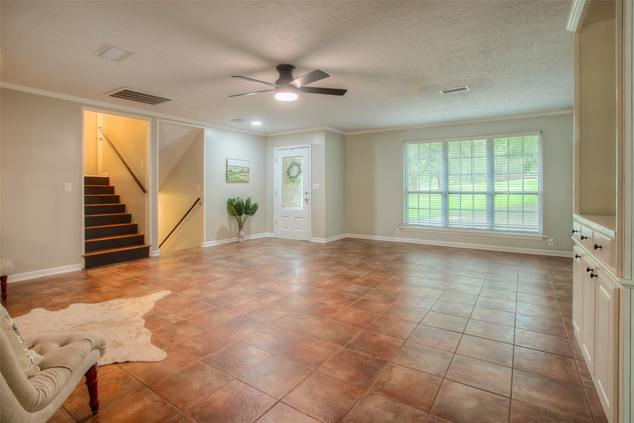 6016 Teas Nursery Road Conroe, TX 77304 - Photo 18 of 50 A view of the living area and entry looking from the breakfast area.