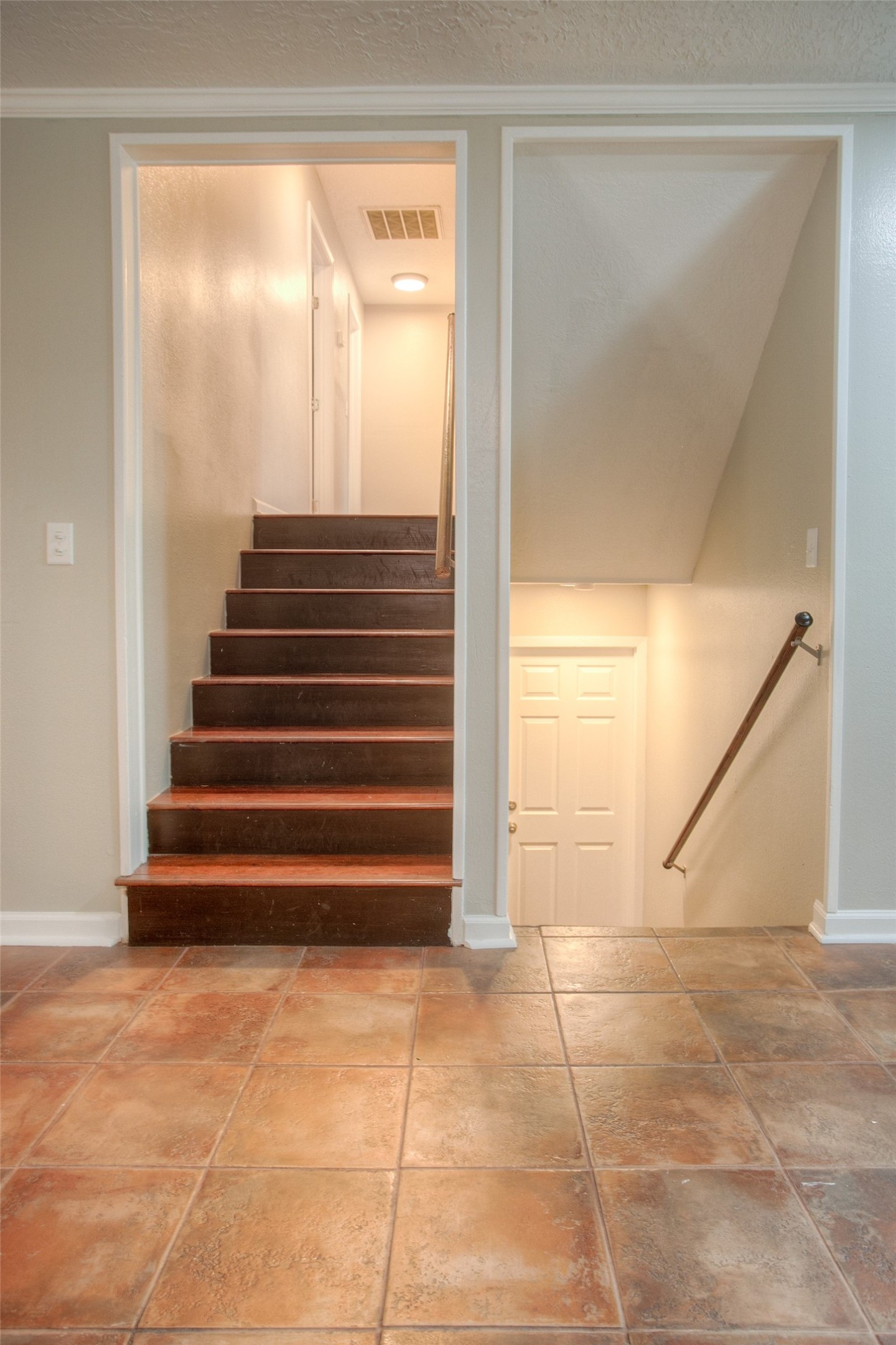 6016 Teas Nursery Road Conroe, TX 77304 - Photo 19 of 50 Stairs leading to the bedrooms/bath rooms and down to the utility room and two care oversized garage.