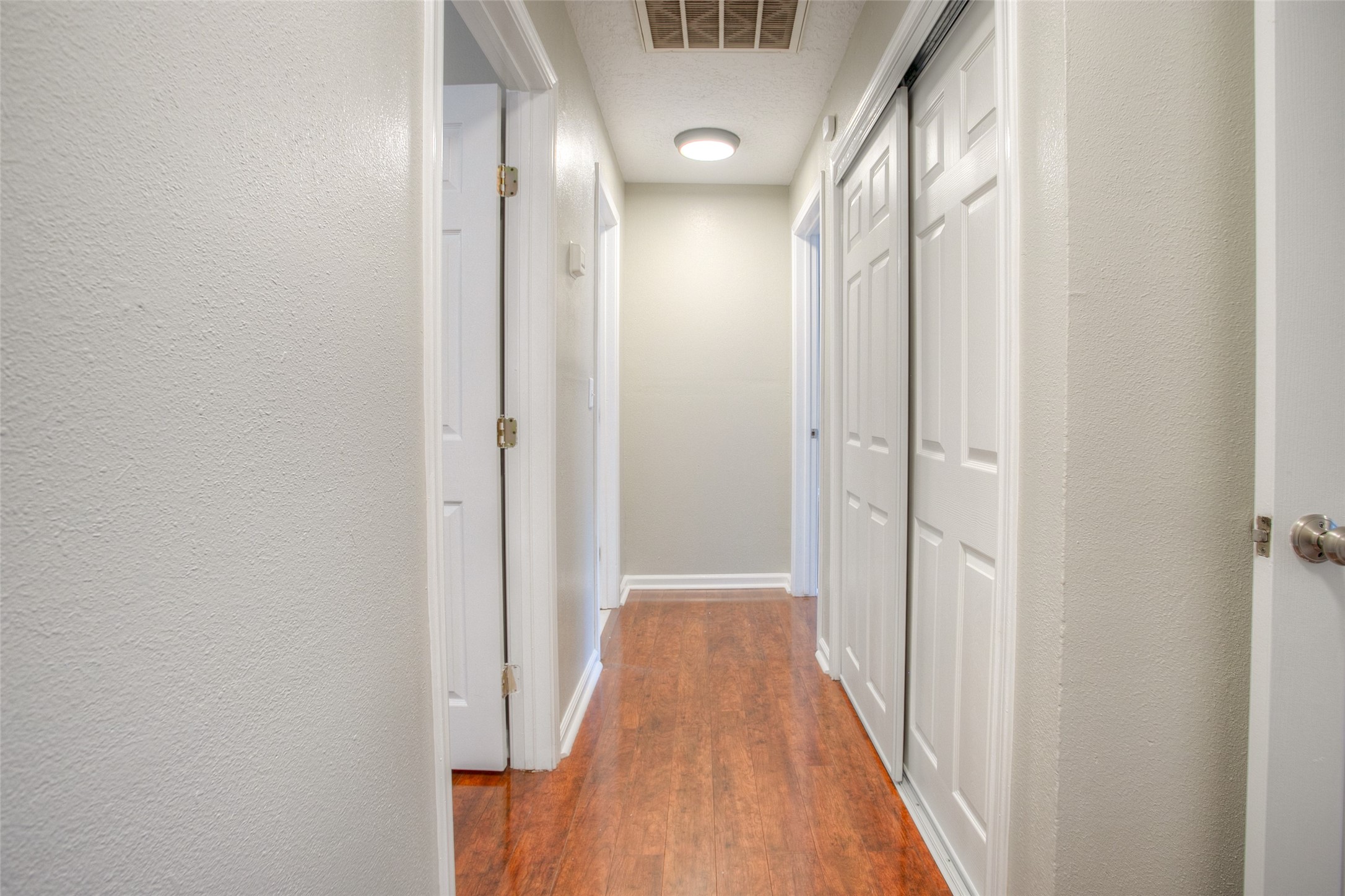 6016 Teas Nursery Road Conroe, TX 77304 - Photo 20 of 50 Hallway leading to bedrooms and bathrooms.