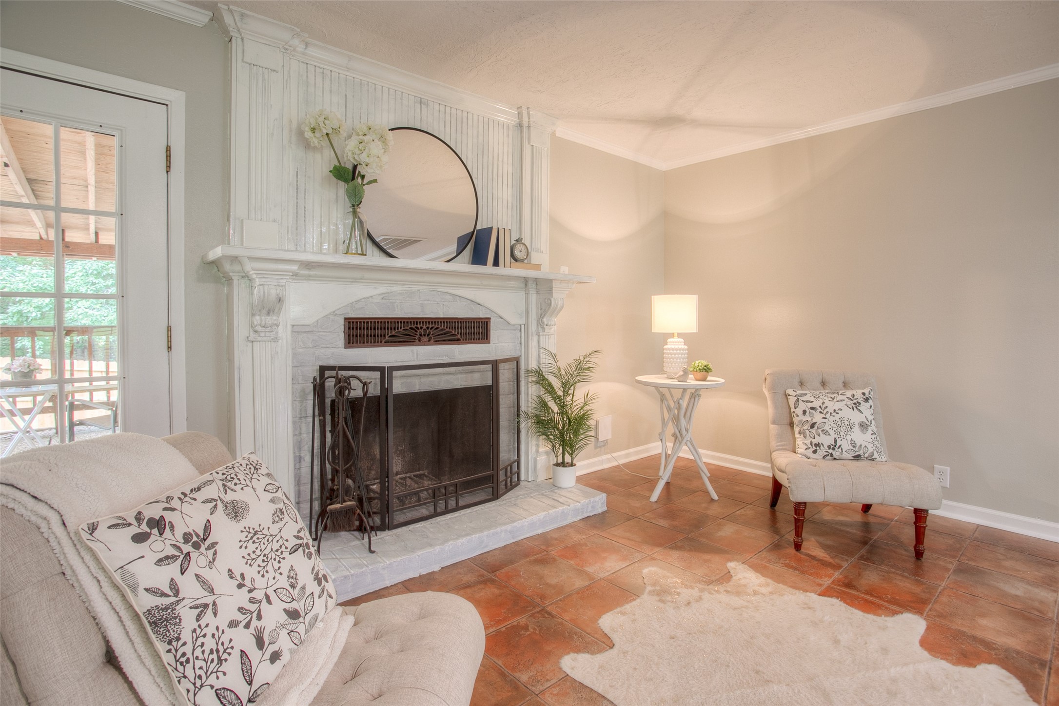 6016 Teas Nursery Road Conroe, TX 77304 - Photo 5 of 50 Toasty wood burning fireplace is located in the center of the large living area.