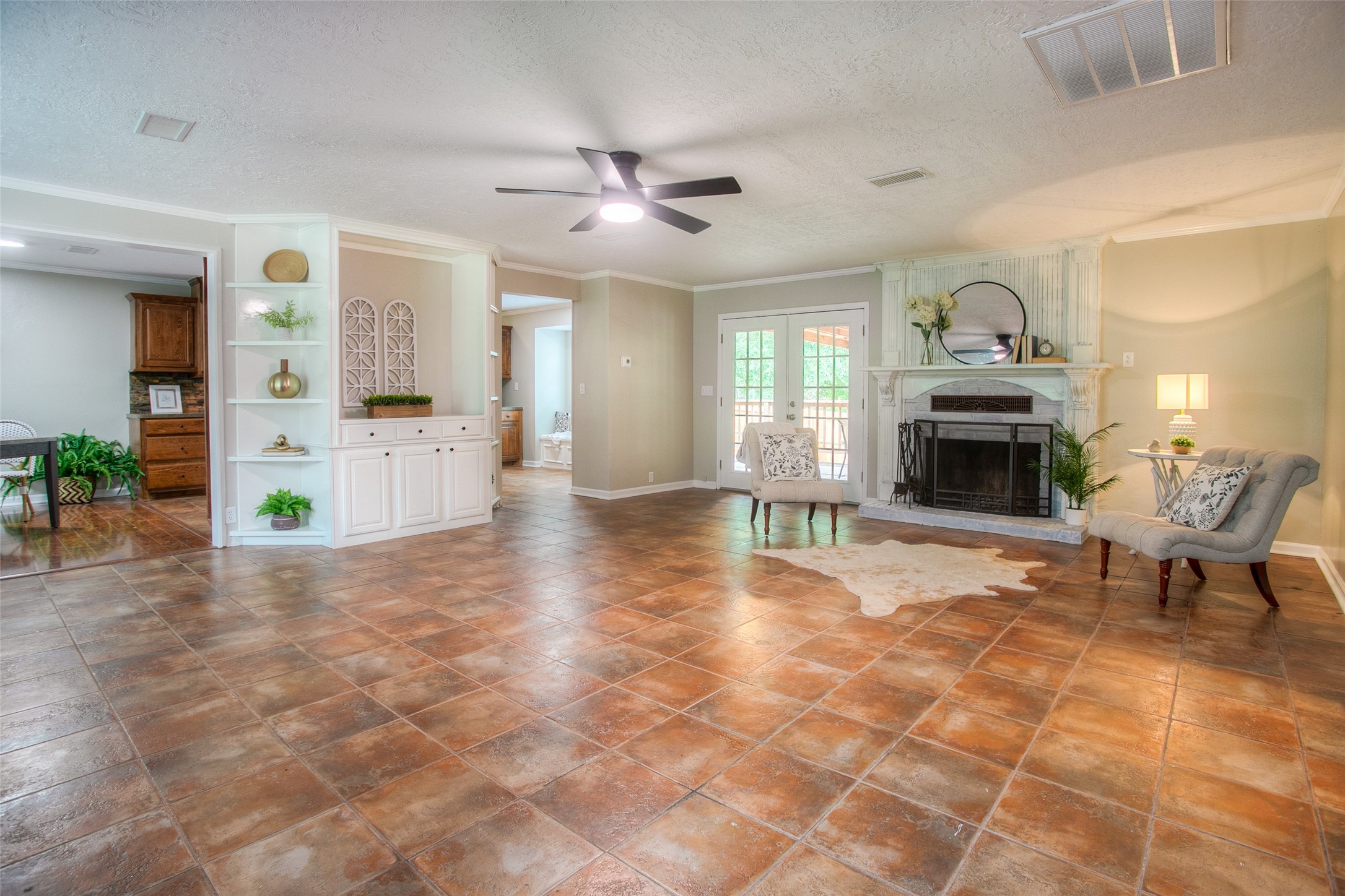6016 Teas Nursery Road Conroe, TX 77304 - Photo 8 of 50 Another view of the living area looking into the dining room and kitchen.