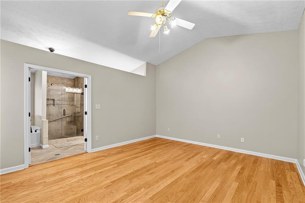 3360 Ennfield Lane Duluth, GA 30096 - Photo 13 of 38 a view of empty room with wooden floor