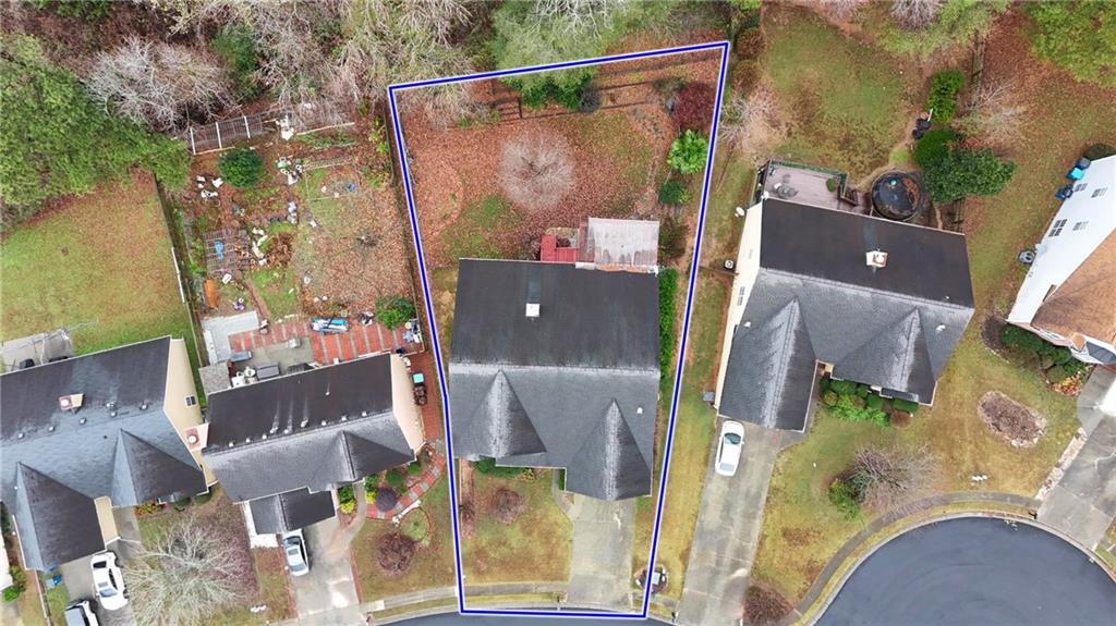 3360 Ennfield Lane Duluth, GA 30096 - Photo 34 of 38 an aerial view of a house with a yard