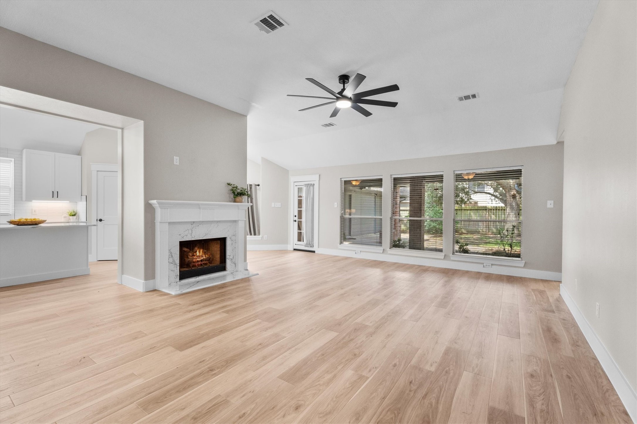 30111 Granum Drive Spring, TX 77386 - Photo 25 of 45 a view of an empty room with wooden floor and a window