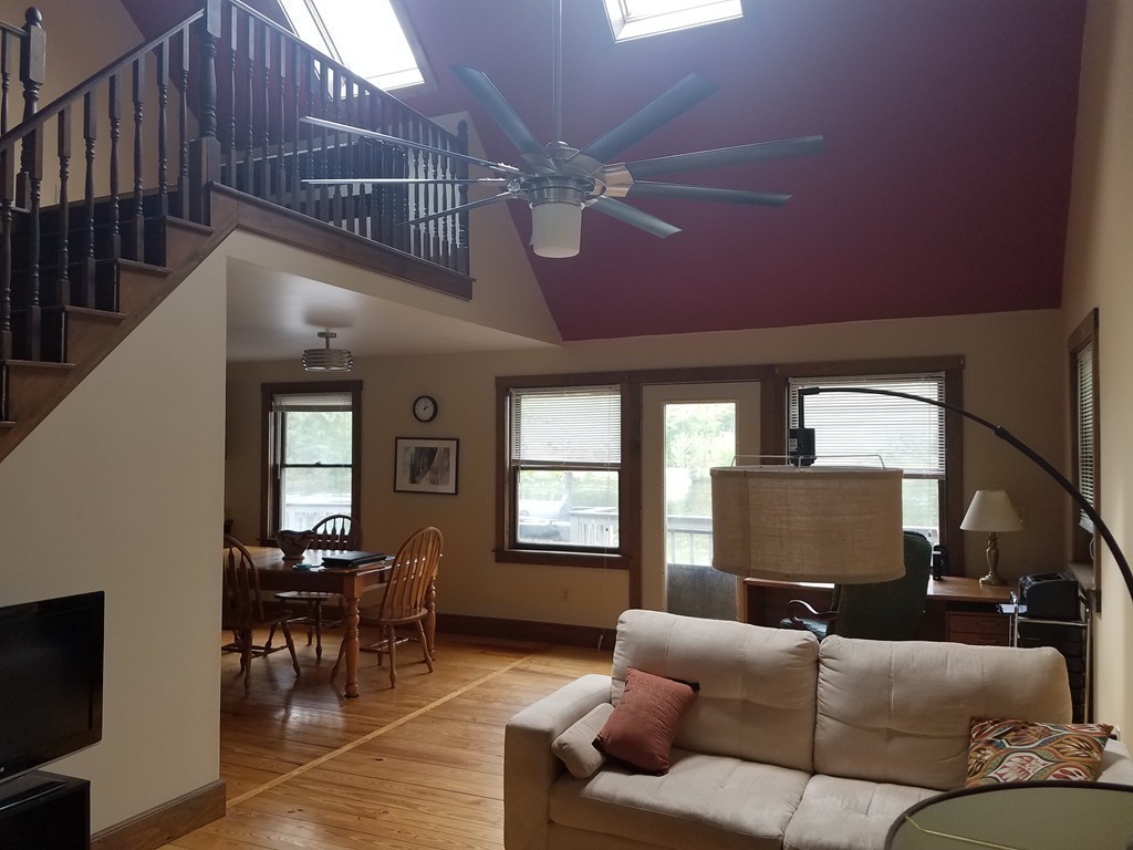 116 West Monomonac Road Winchendon, MA 01475 - Photo 15 of 22 a living room with furniture a ceiling fan and a window