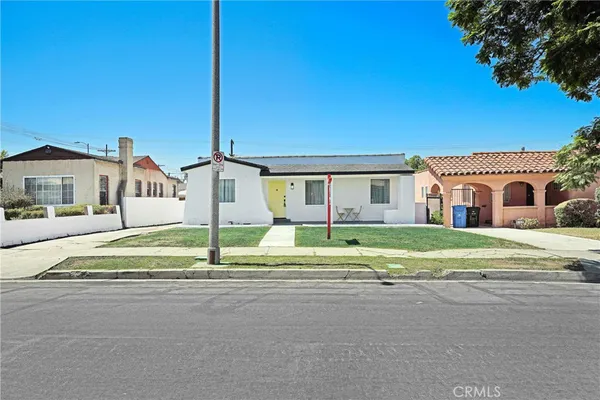 a house with a white fence