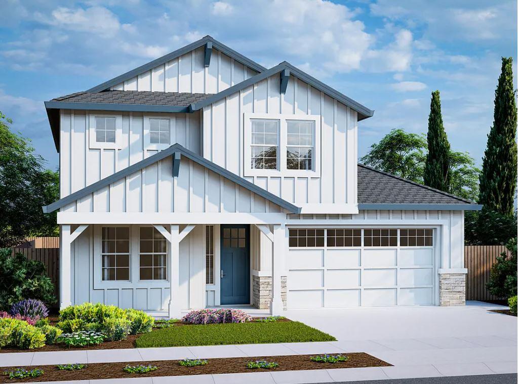 a front view of a house with a yard and porch
