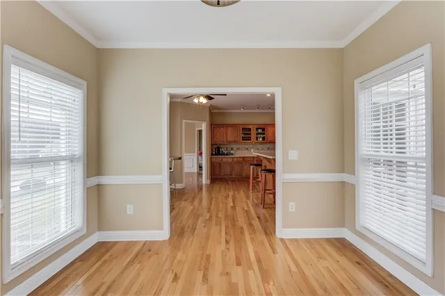 a view of a living room and a wooden floor