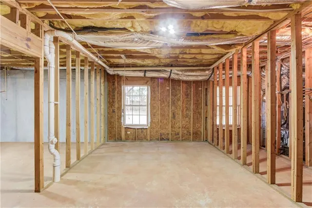 a view of deck with large trees