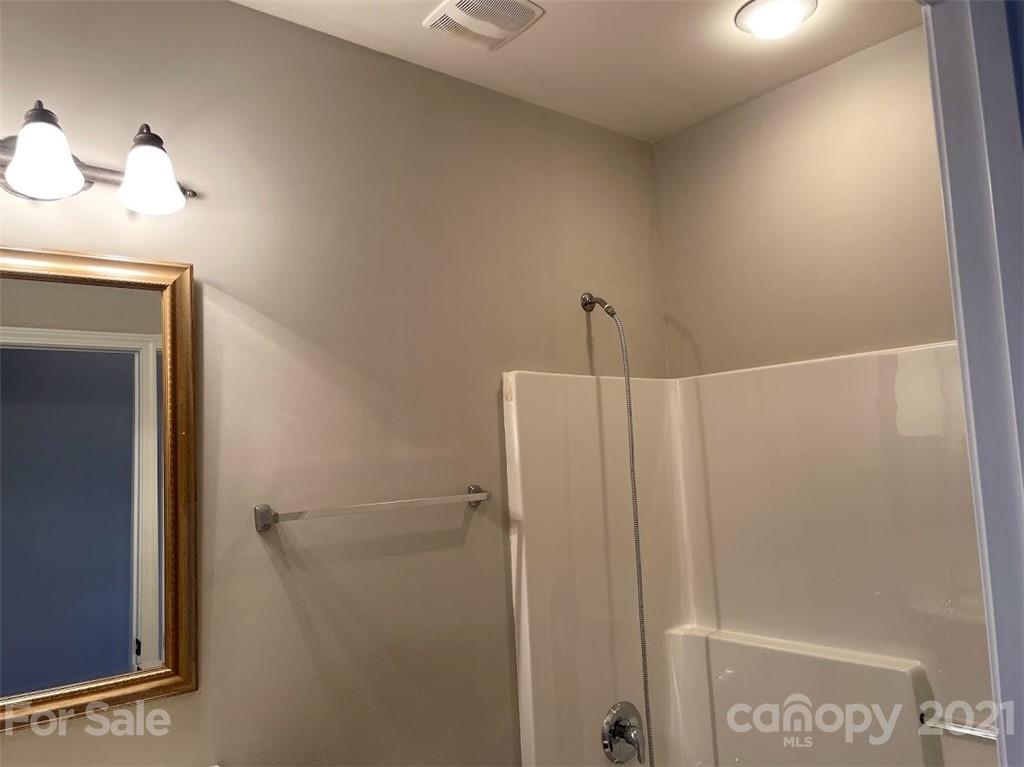 261 Garnet Court Fort Mill, SC 29708 - Photo 8 of 33 a bathroom with a shower and a sink