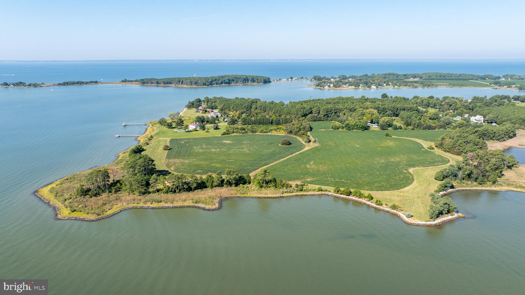 Bar Neck Road Tilghman, MD 21671 - Photo 2 of 4 an aerial view of a residential houses with outdoor space and swimming pool